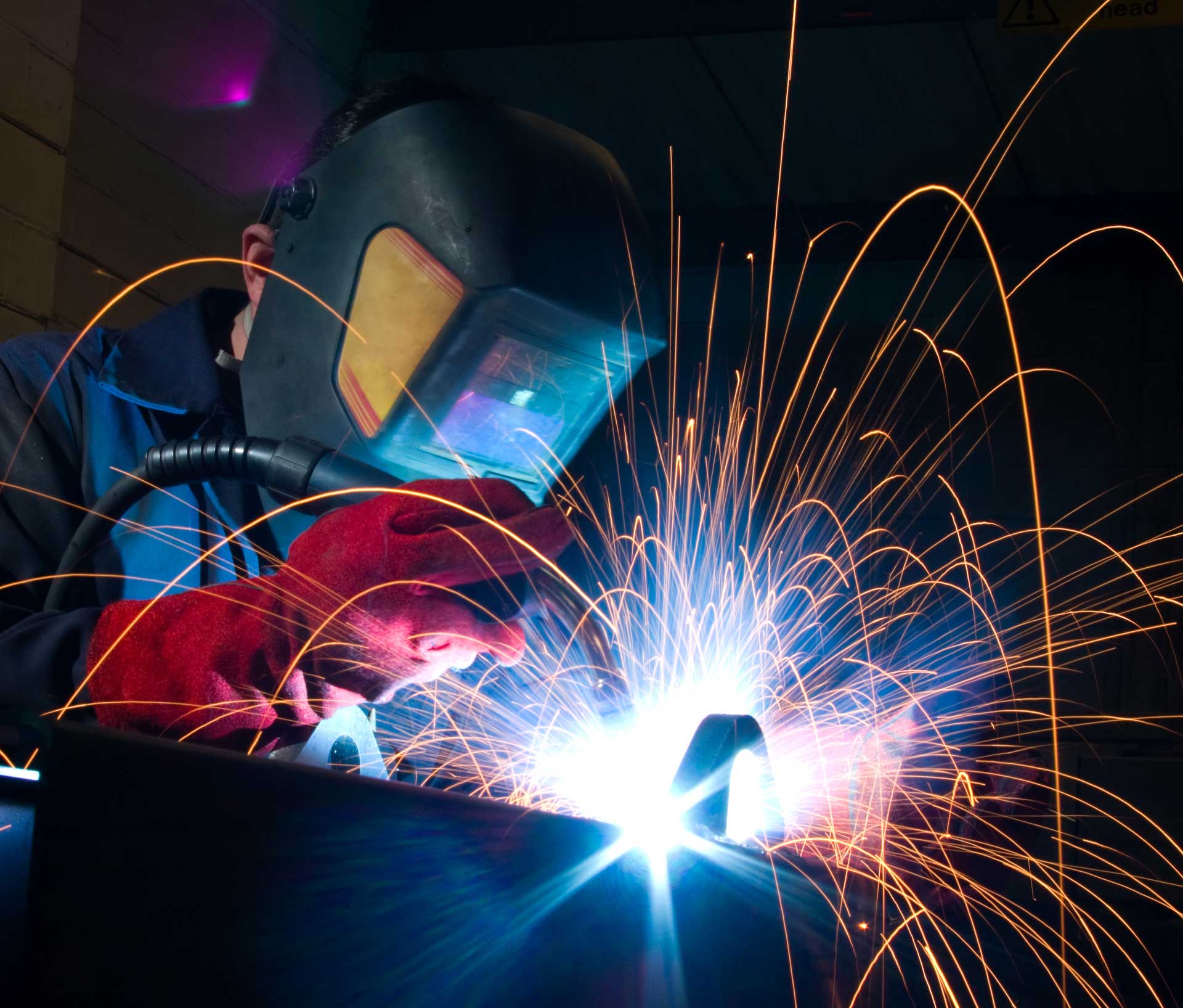 Emrack manufacturing staff welding 